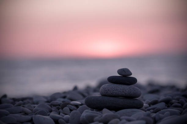 istock stack of zen stones on pebble beach 1131885025