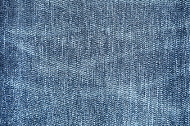 istock Texture of blue jeans as background, space for text 1131886254