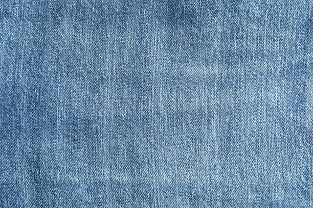 istock Texture of blue jeans as background, space for text 1131886280