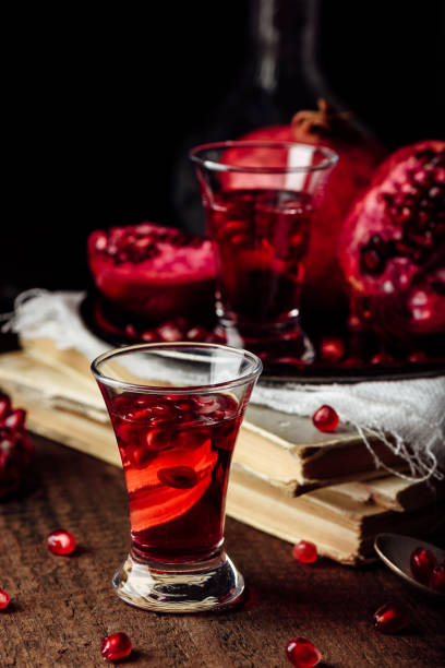 Pomegranate liqueur Pomegranate liqueur with fresh fruit nalewka stock pictures, royalty-free photos & images