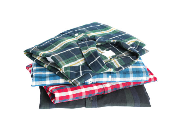 istock Stack of colorful shirts isolated on white background 1131886591