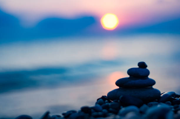 istock stack of zen stones on pebble beach 1131886598