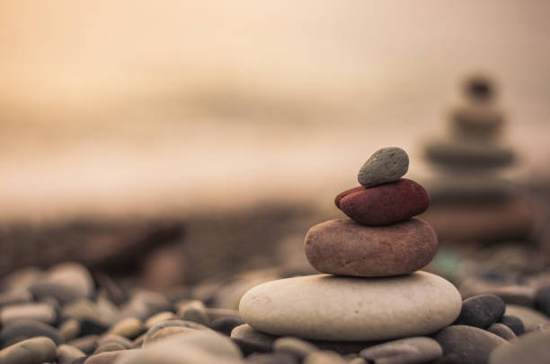 istock stack of zen stones on pebble beach 1131886710
