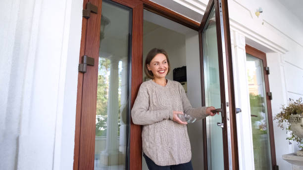 istock Happy middle-aged woman standing with empty plate, trick or-treating event 1131890099