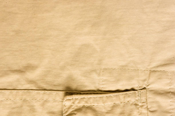 istock clothing items washed cotton fabric texture with seams 1131890219