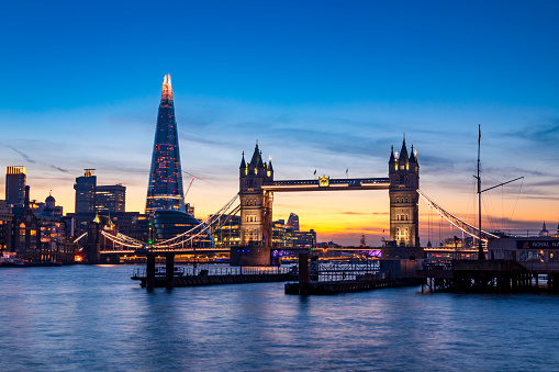 A beautiful sunset shot looking over the Thames towards Londons iconic Tower Bridge and on towards the Shard.
