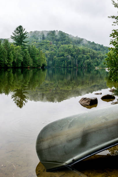 istock Peaceful fishing lake with mountain range 1131894323