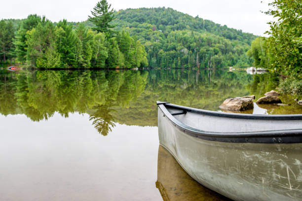 istock Peaceful fishing lake with mountain range 1131895062