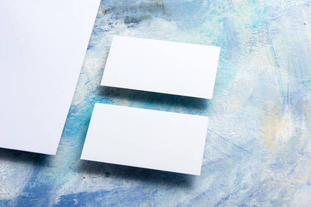 istock Business cards blank. Mockup on color background. Flat Lay. copy space for text 1131895639