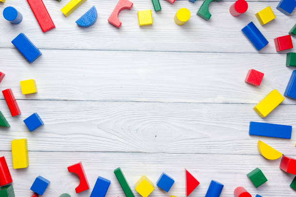 istock Kids educational developing toys frame on white background. Top view. Flat lay. Copy space for text 1131897831
