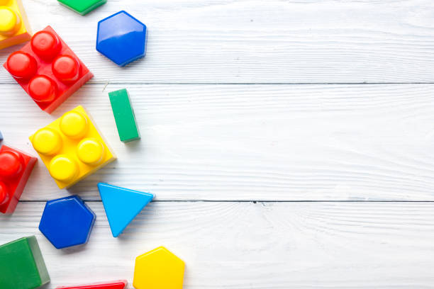 istock Kids educational developing toys frame on white background. Top view. Flat lay. Copy space for text 1131897973