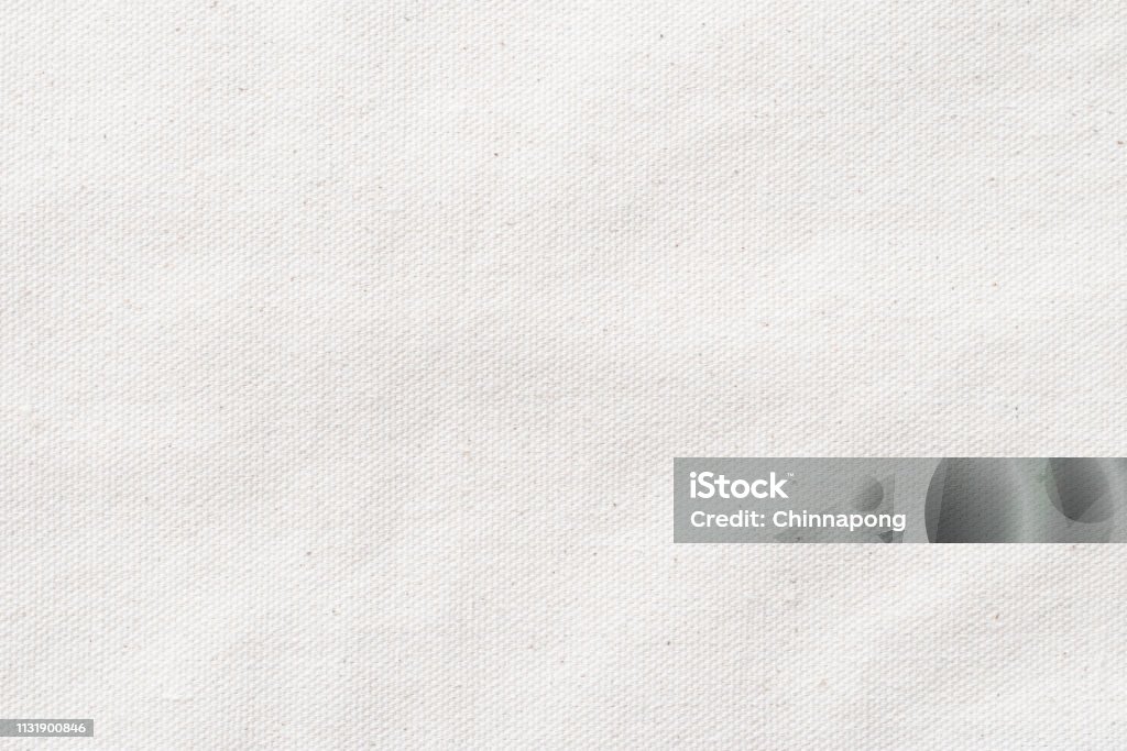 White canvas burlap texture background of cotton natural fabric cloth for wallpaper and design backdrop Textured Stock Photo