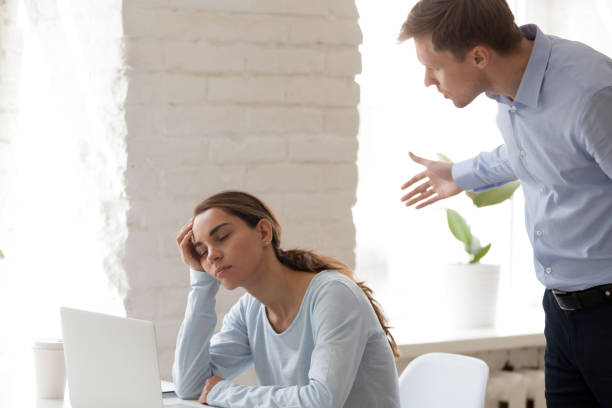 istock Boss caught tired employee when she fell asleep at workplace 1131900971