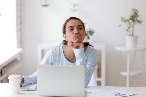 istock Employee tired to work taking a break making funny face 1131900977