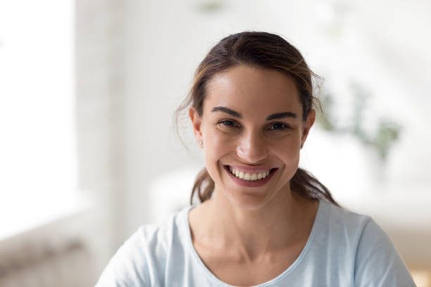 istock Close up portrait happy mixed race female 1131901023