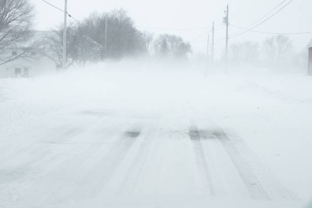 istock Hazardous white out blizzard snow driving conditions 1131901511