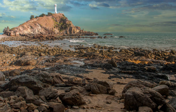 istock Lighthouse on the island by the sea 1131901679