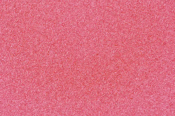 Abstract textured sandpaper, close up as background