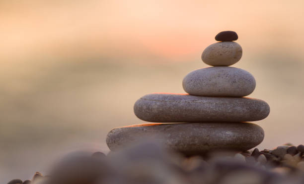 istock stack of zen stones on pebble beach 1131906737