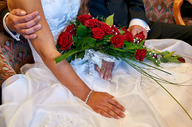 istock bride holding wedding bouquet and groom 1131906795