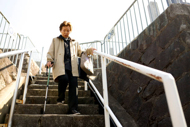 istock Asian seniors and stairs 1131910340