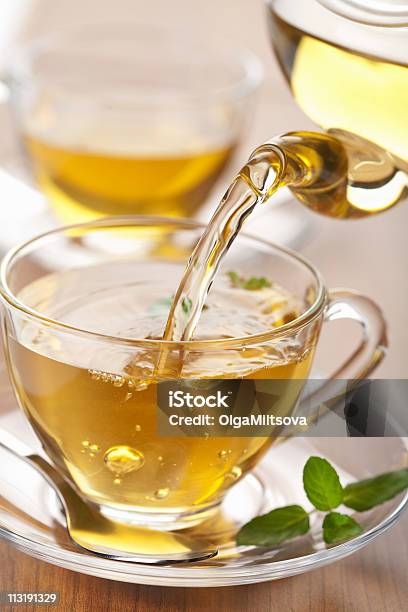 Green Tea Pouring Into Glass Cup Stock Photo - Download Image Now - Antioxidant, Close-up, Color Image