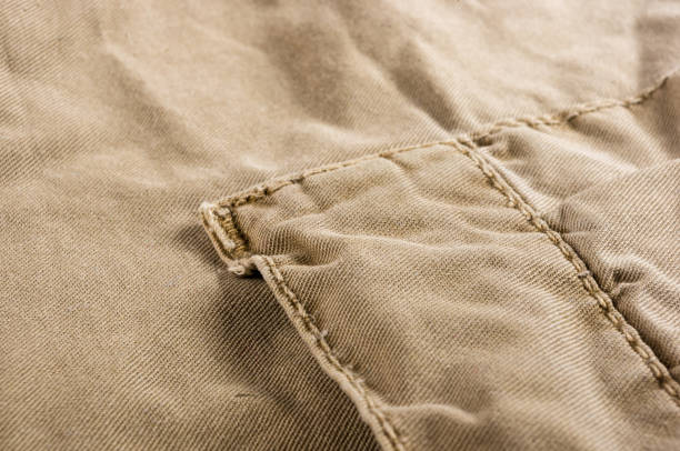 istock clothing items washed cotton fabric texture with seams 1131914968