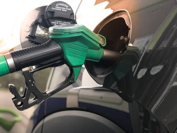 Refueling car on a petrol station. Concept of a fuel price change Refueling car on a petrol station. Concept of a fuel price change fuel prices photos stock pictures, royalty-free photos & images