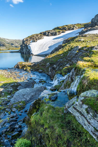 istock Waterfall landscape on the mountain slope in Norwegian highlands 1131916964