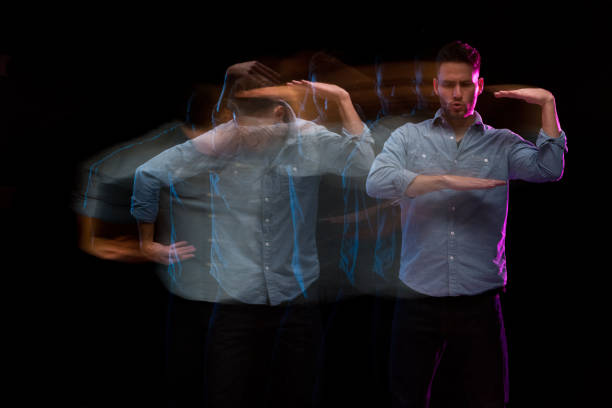 istock Handsome man in a blue shirt dancing 1131917702