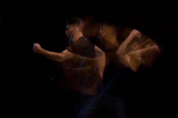 istock Good looking man in a black shirt dancing 1131917752
