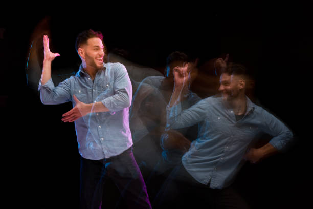 istock Handsome man in a blue shirt dancing 1131917759