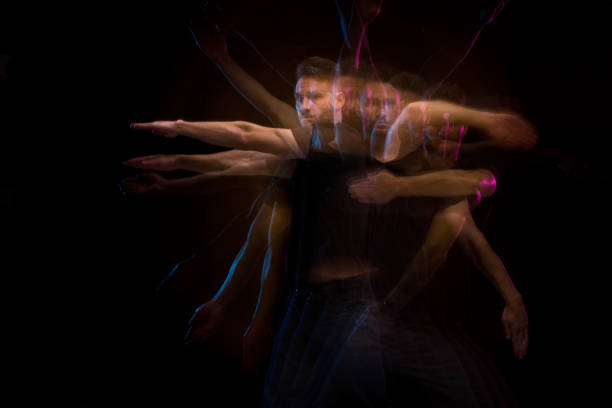 istock Good looking man in a black shirt dancing 1131917783