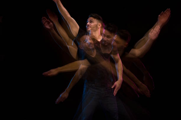 istock Good looking man in a black shirt dancing 1131917813