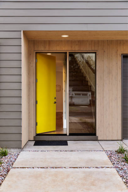 Yellow Front door of a modern house stock photo