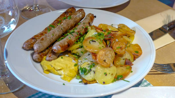 istock Bratwurst with roasted potatoes in Wuzburg, Germany 1131925282