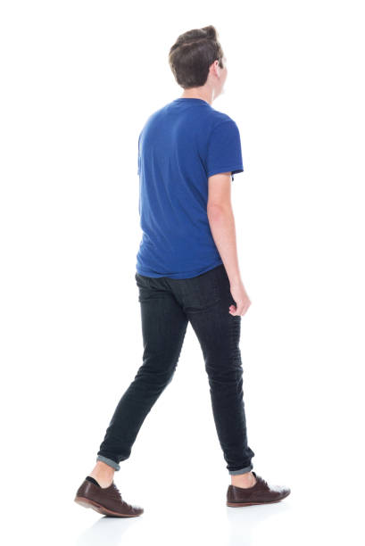 istock Young high school age male walking 1131933534