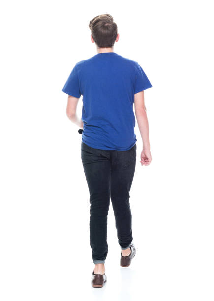 istock Young high school age male walking 1131933539