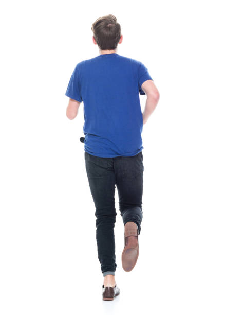 istock Young high school age male running 1131933560