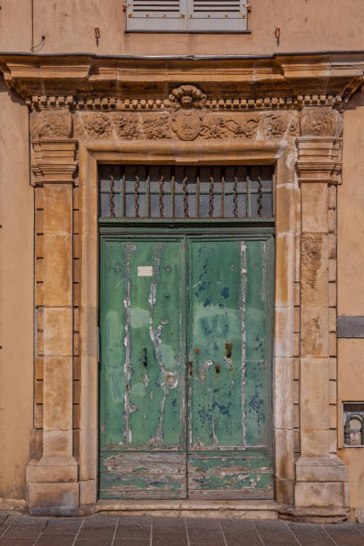 istock Typical Provencal House with green door and window 1131945637