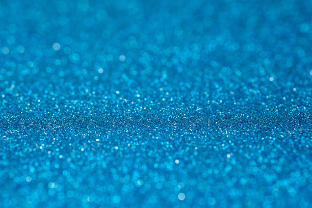 istock Abstract blue sparkling glitter wall and floor perspective background studio with blur bokeh.luxury holiday backdrop mock up for display of product.holiday festive greeting card. 1131959530