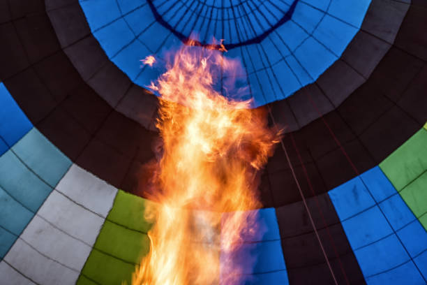 A hot air balloon with a flame on it