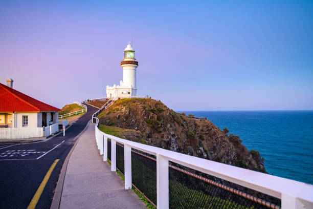 Pathway leading to Byron Bay Pathway leading to Byron Bay at sunset. byron bay stock pictures, royalty-free photos & images