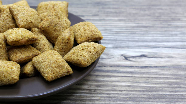 istock crackers on a plate on a wooden background 1131962963