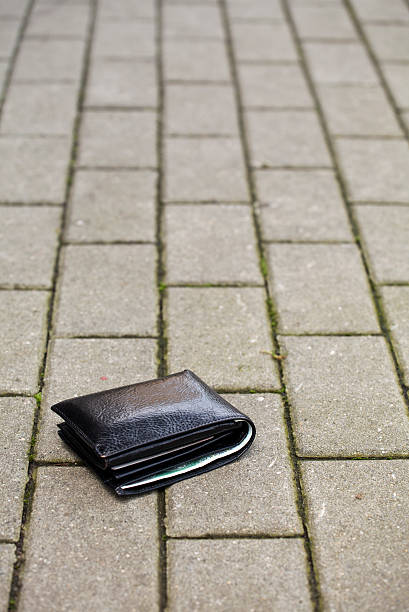 istock Lost wallet at the sidewalk 113196425
