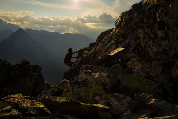 istock Climbing to the top of the mountain 1131964607