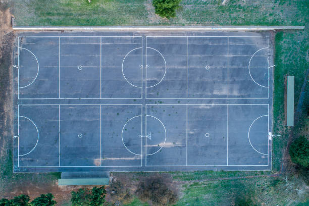istock Aerial view looking down at netball and basketball courts 1131969926