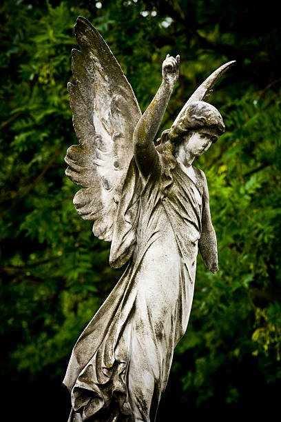 istock Beautiful angel in a cemetary 113197087