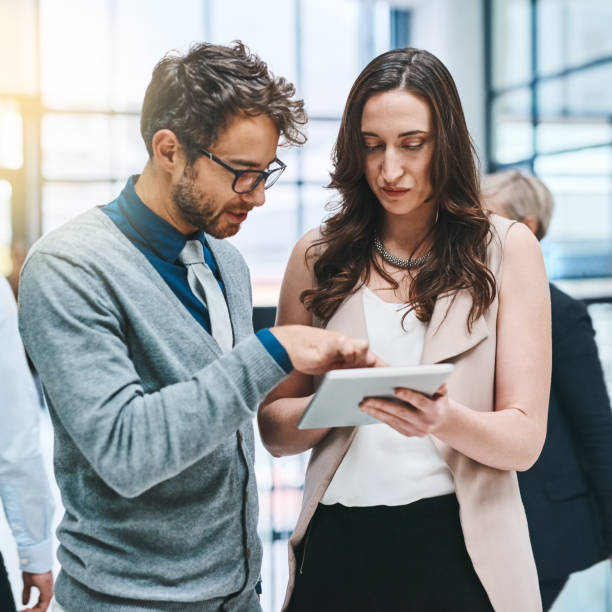 istock Working with the latest apps to better their business 1131972230