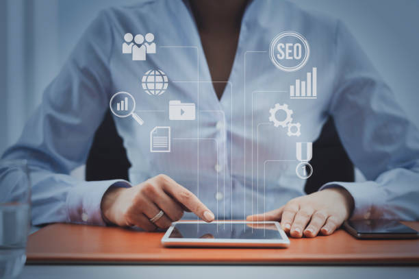 istock Businesswoman working with her tablet and user interface 1131973891